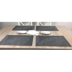 All four tablemats with centre piece. Woven vinyl Fleximats Sable design by Plymouth Pottery