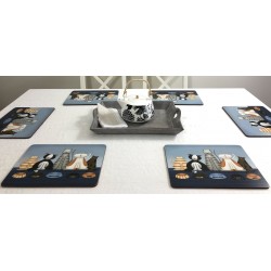 White tablecloth with animal design tablemats of Hungry Cats, corkbacked hard surface by Plymouth Pottery