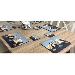 Animal tablemats of Hungry Cats, corkbacked with hard surface on wooden dining table with teapot