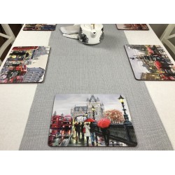 Wide view of Streets of London corkbacked placemats on grey runner