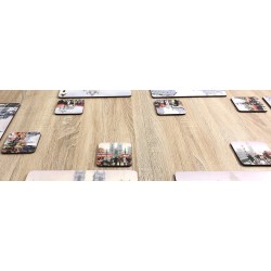 Close up of Streets of London corkbacked coasters on wooden dining table