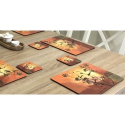 Sunset design corkbacked tablemats. Side view on wooden dining table