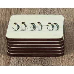 Set of 6 Penguin Parade drinks coasters by Plymouth Pottery neatly stacked