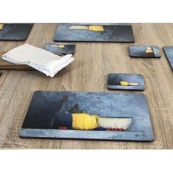 Blue Harmony fruit based set of 6 tablemats on wooden table with white napkin